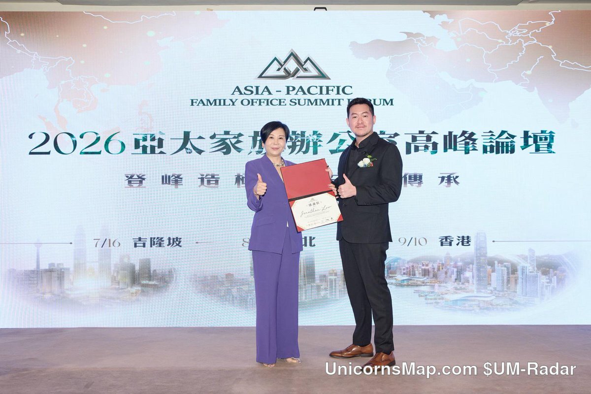 Stage presentation in front of the Asia-Pacific Family Office Summit Forum 2026 backdrop