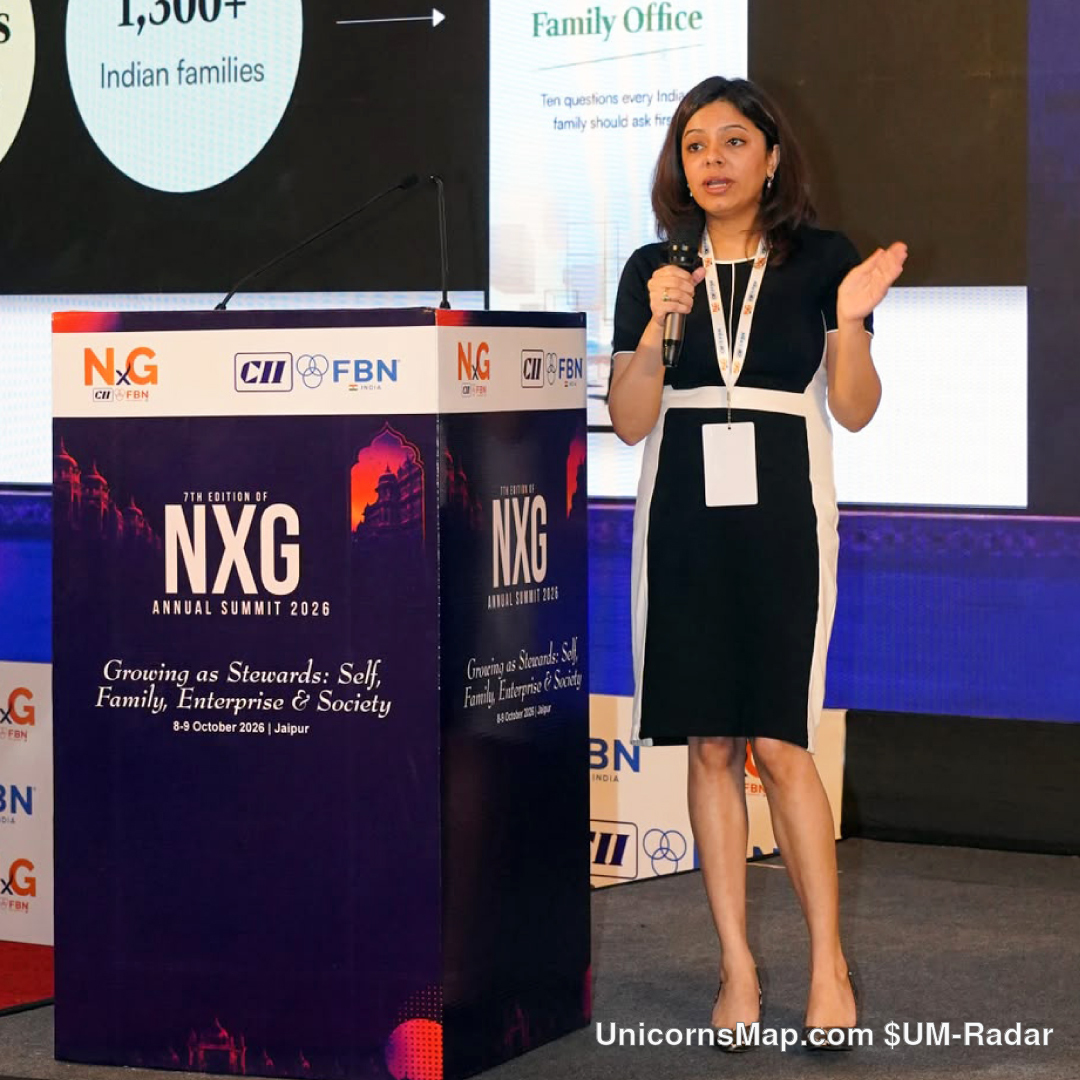 CII-FBN 7th NxG Annual Summit 2026 — Chahat Sekhon speaking at the branded NXG podium with the ‘Growing as Stewards’ summit cube, ITC Rajputana, Jaipur