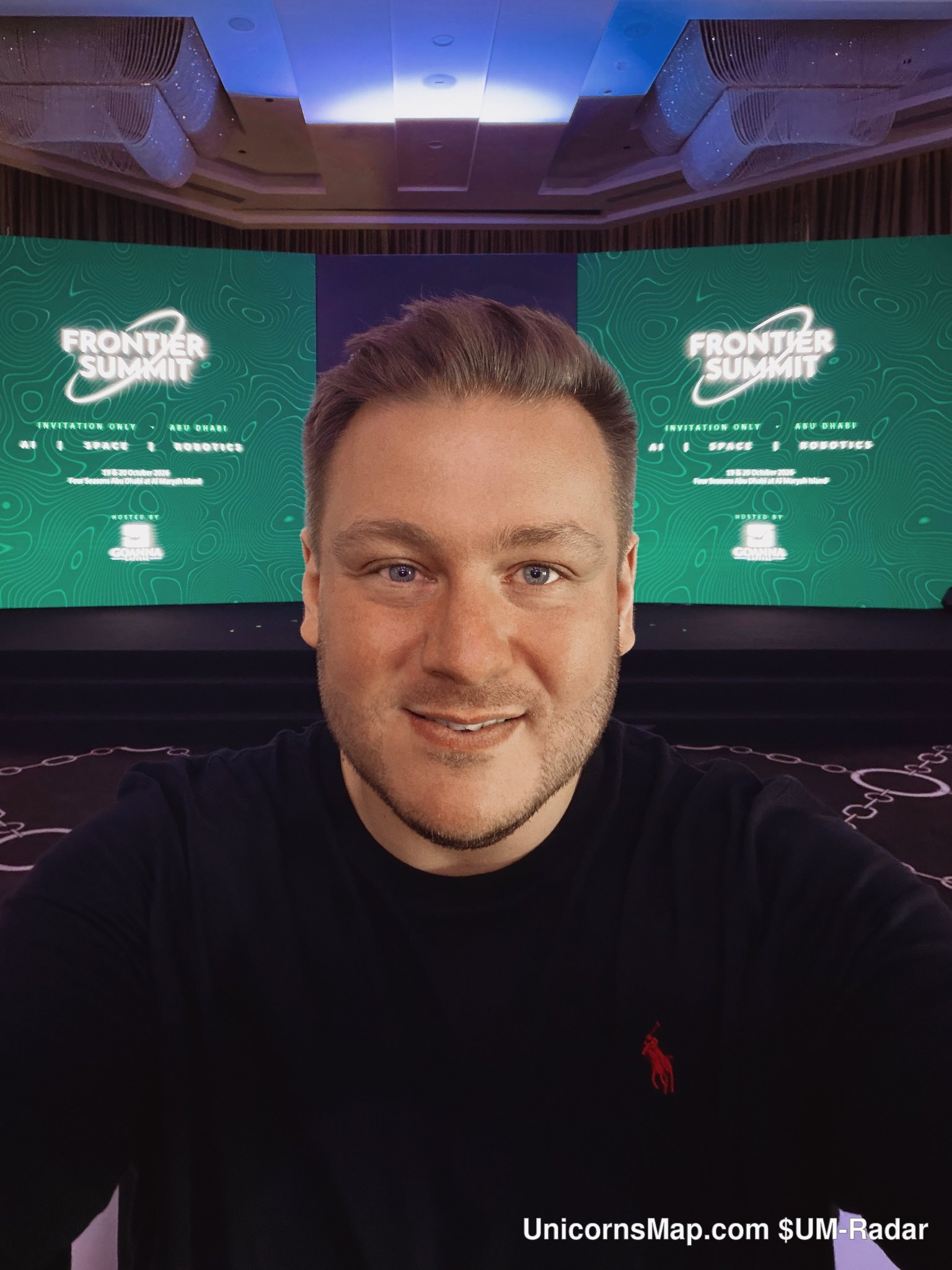 Frontier Summit 2026 Abu Dhabi — venue LED walls reading FRONTIER SUMMIT, INVITATION ONLY, ABU DHABI, AI | SPACE | ROBOTICS