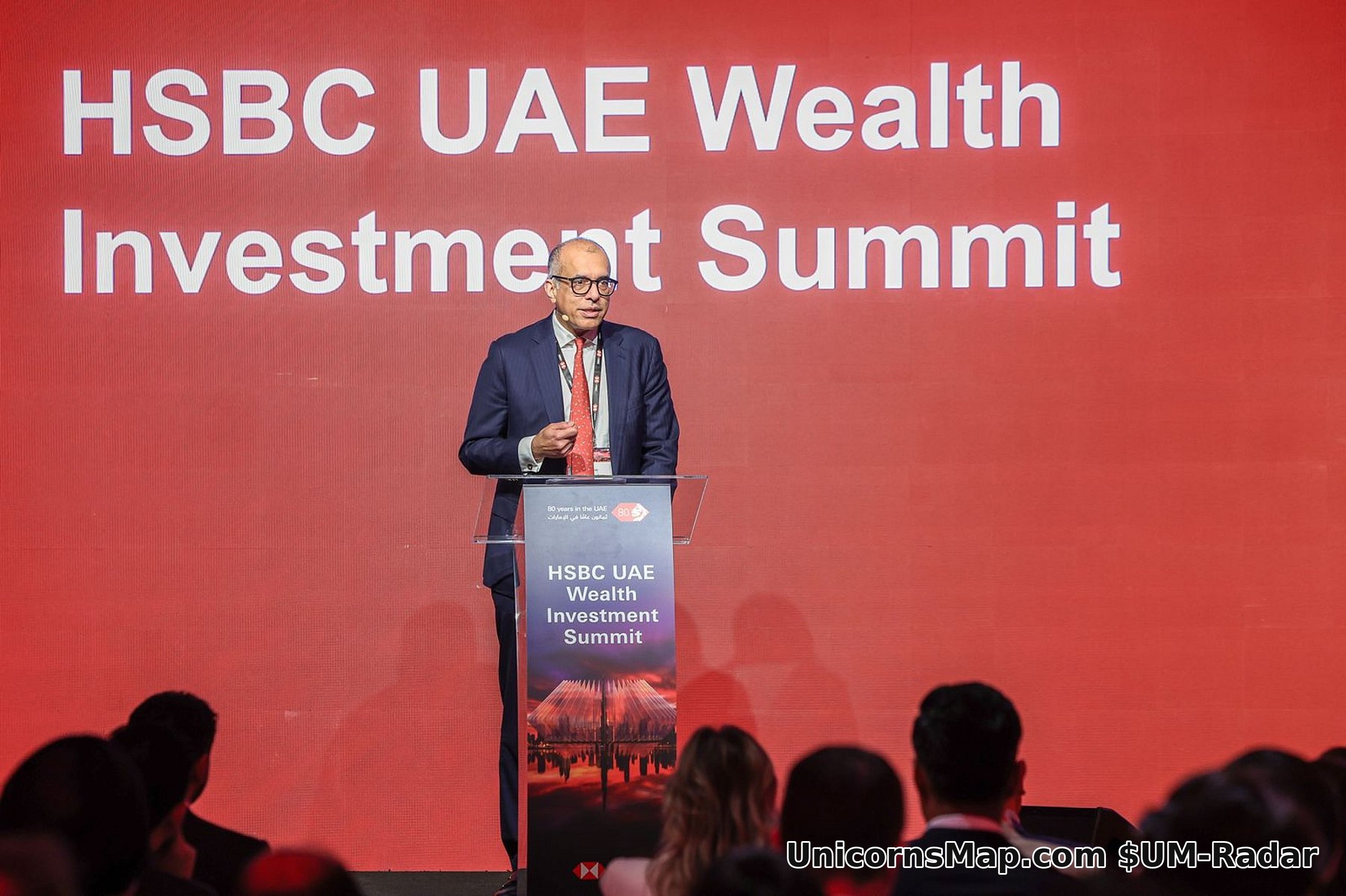 Surendra Rosha, Co-Chief Executive Asia and Middle East of HSBC Holdings, at the lectern under an LED wall reading HSBC UAE Wealth Investment Summit, Four Seasons Dubai, 22 October 2026