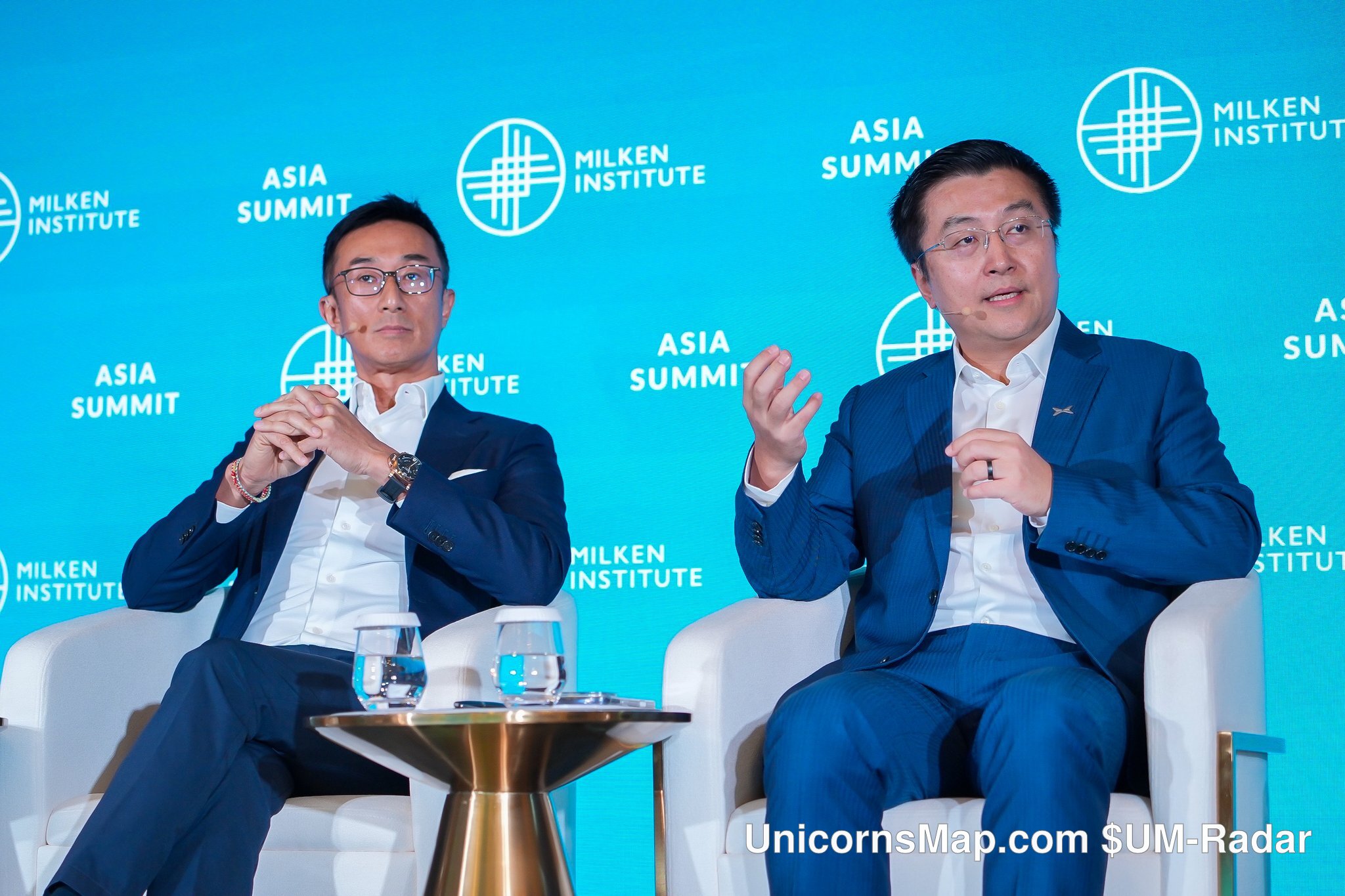 Milken Institute Asia Summit 2026 — two panellists in conversation on the Asia Summit 2026 stage, Singapore