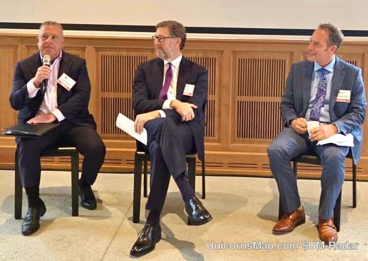 Pepperdine Global Family Office Summit 2026 — three-person panel seated on the Château d’Hauteville stage, speaker with a microphone, name badges visible