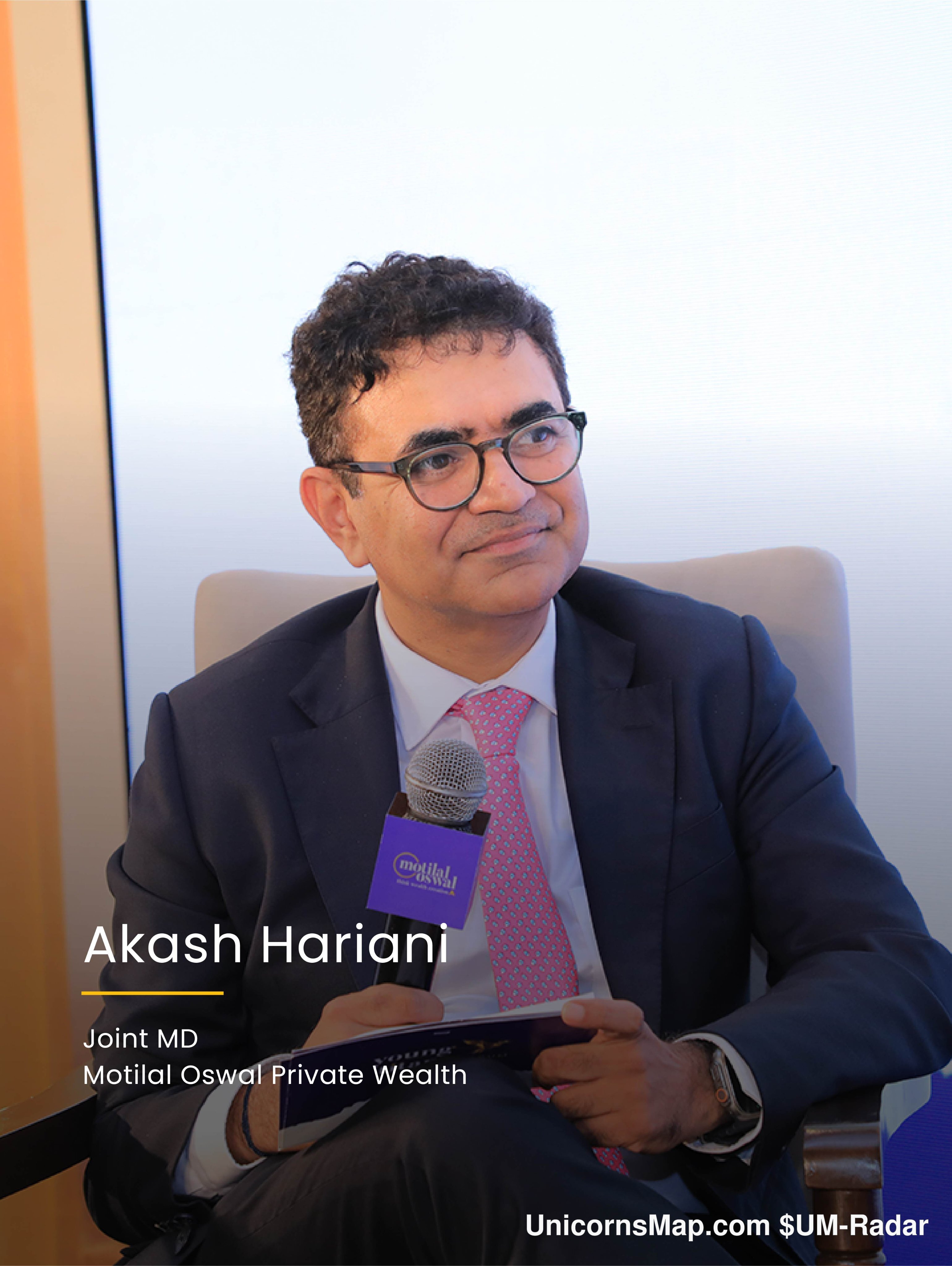 Young Titans Forum 2026 Delhi Edition — Akash Hariani, Joint MD, Motilal Oswal Private Wealth, on stage with a motilal oswal-branded microphone, in-frame caption reproduced from the organizer's own photograph